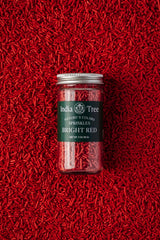 India Tree Bright Red Sprinkles on cupcakes for festive red finish