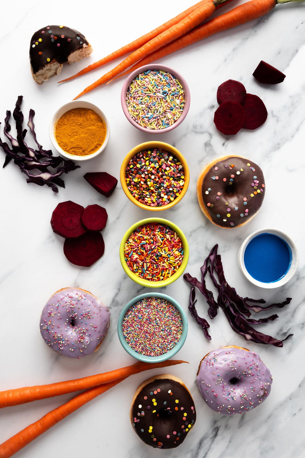 India Tree rainbow sprinkles on cupcakes