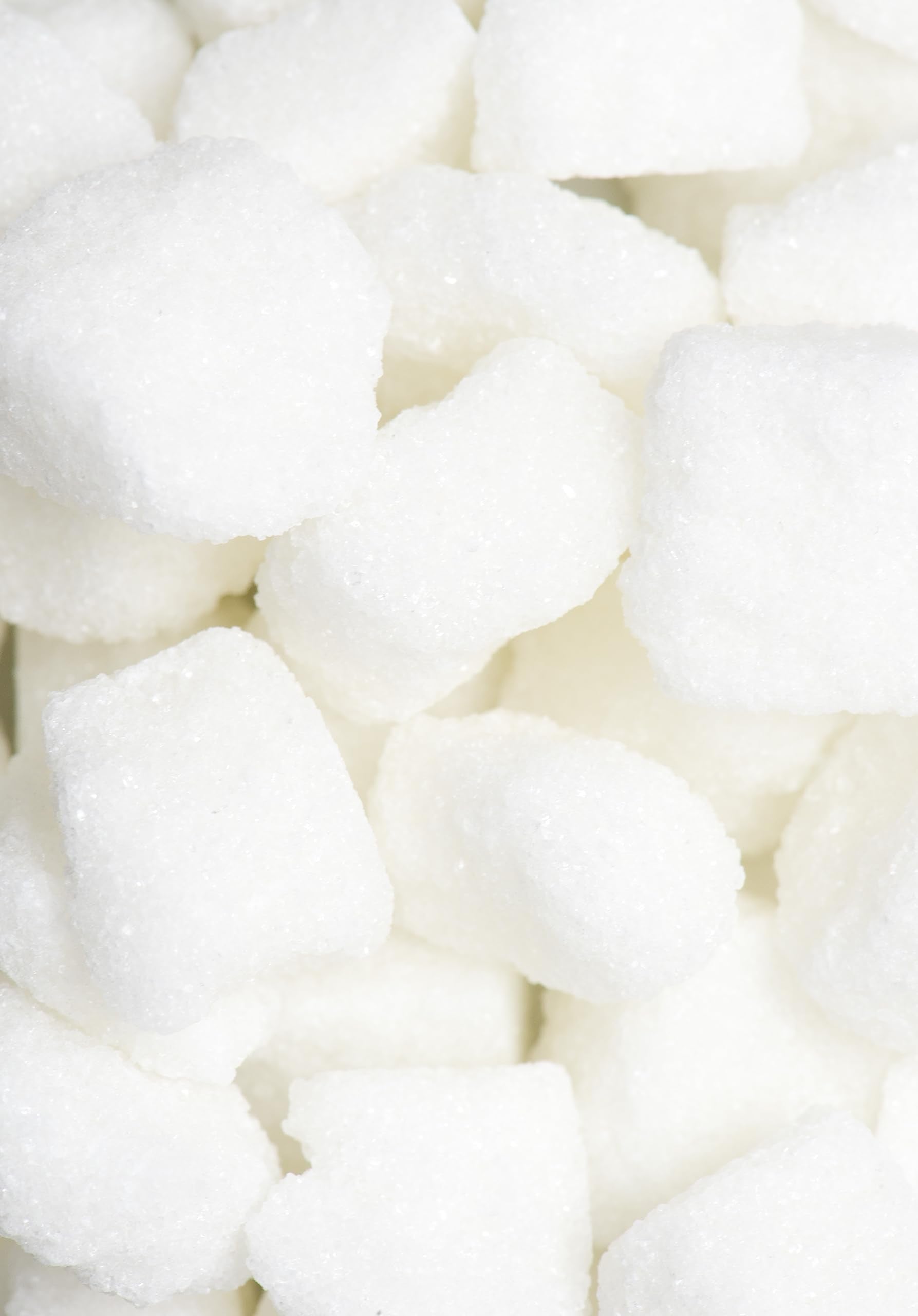 India Tree sugar cubes with tea cup for smooth cane sweetness.