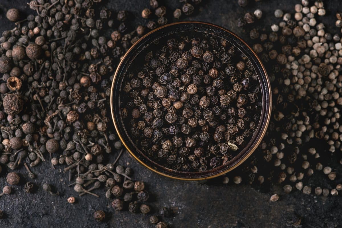 Tellicherry peppercorns from India Tree over meat and seafood dishes
