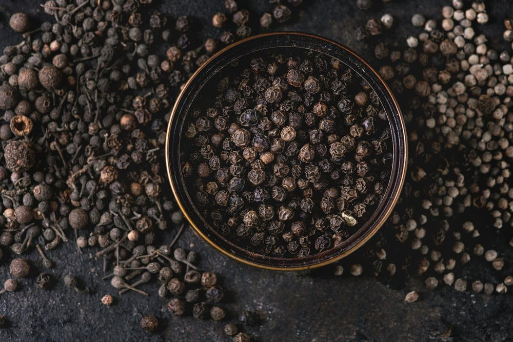 Tellicherry peppercorns from India Tree over meat and seafood dishes