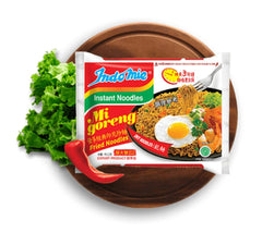 Indomie Mi Goreng noodles cooking in pan with sauce, easy weeknight stir-fry