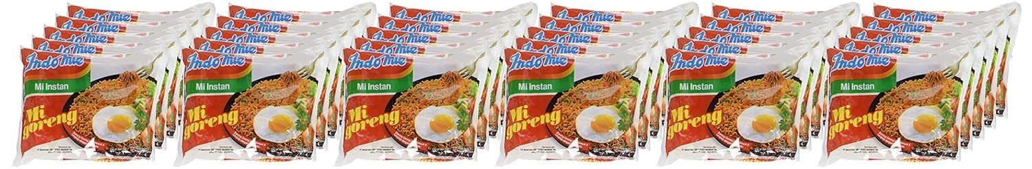 Indomie Mi Goreng spice-sauce packet close-up, ready to mix