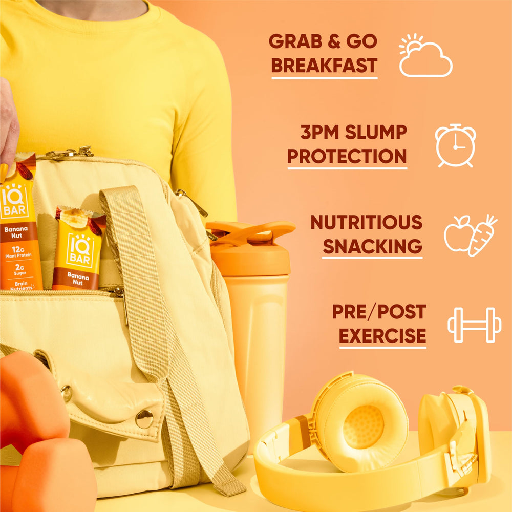 IQBAR Banana Nut bar in hand for on-the-go energy.