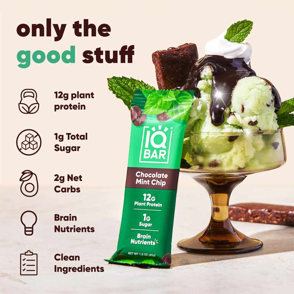 IQBAR Chocolate Mint Chip bar being broken for a bite.