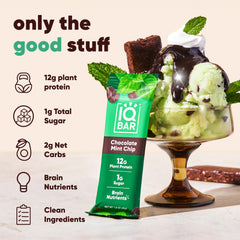 IQBAR Chocolate Mint Chip bar being broken for a bite.