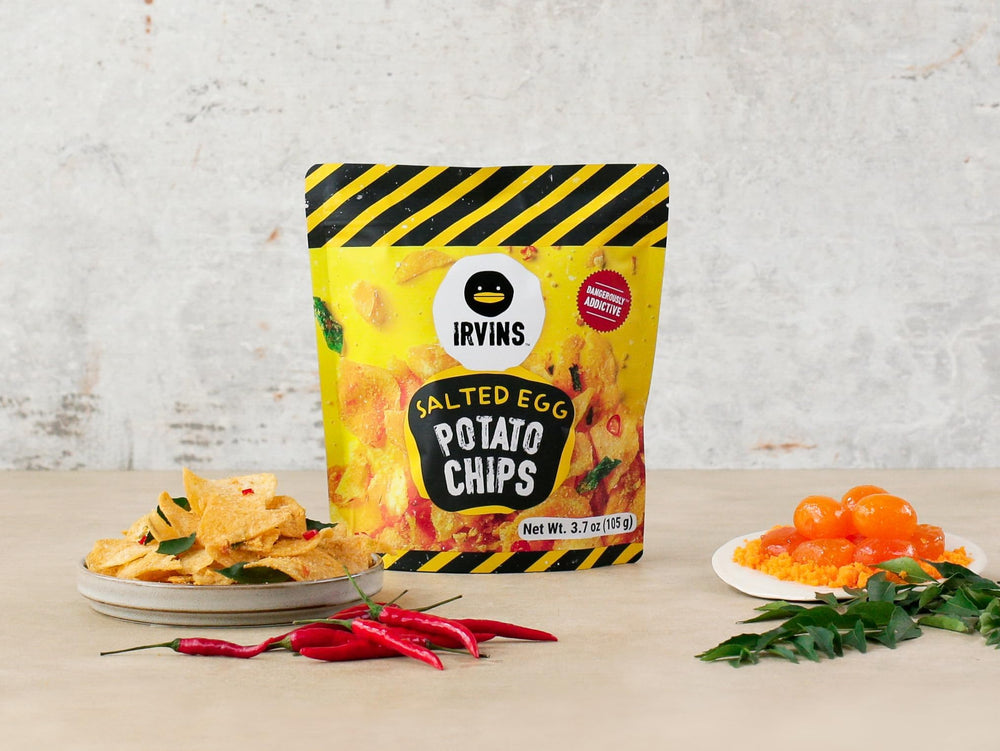 Irvins Salted Egg Potato Chips resealable-pack preserves freshness between bites.