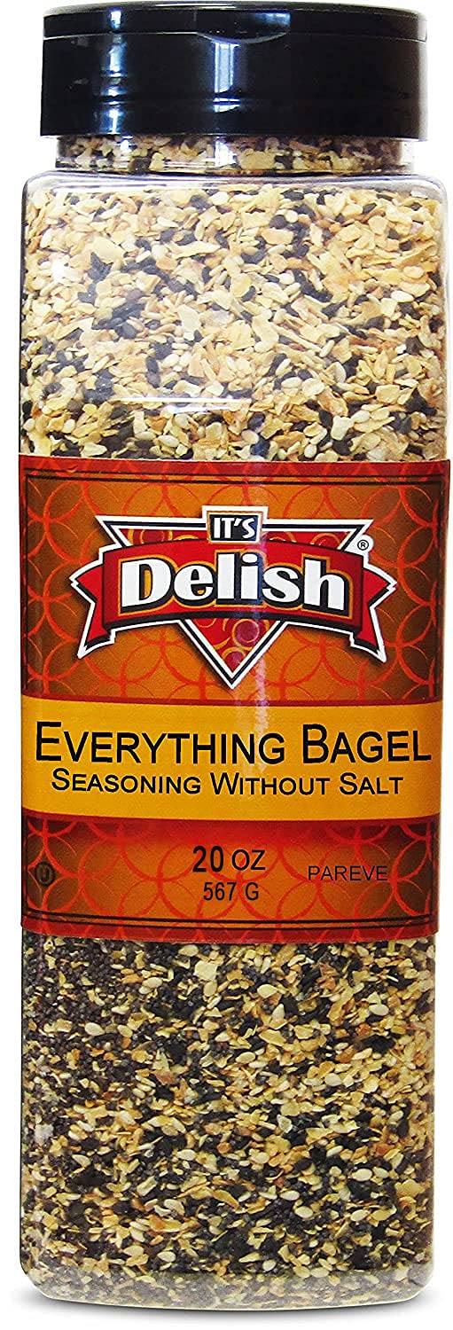 Pouring It's Delish No Salt Everything Bagel Seasoning shows easy sprinkling