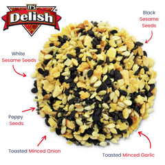 Close-up of sesame seeds and garlic in It's Delish seasoning for premium crunch