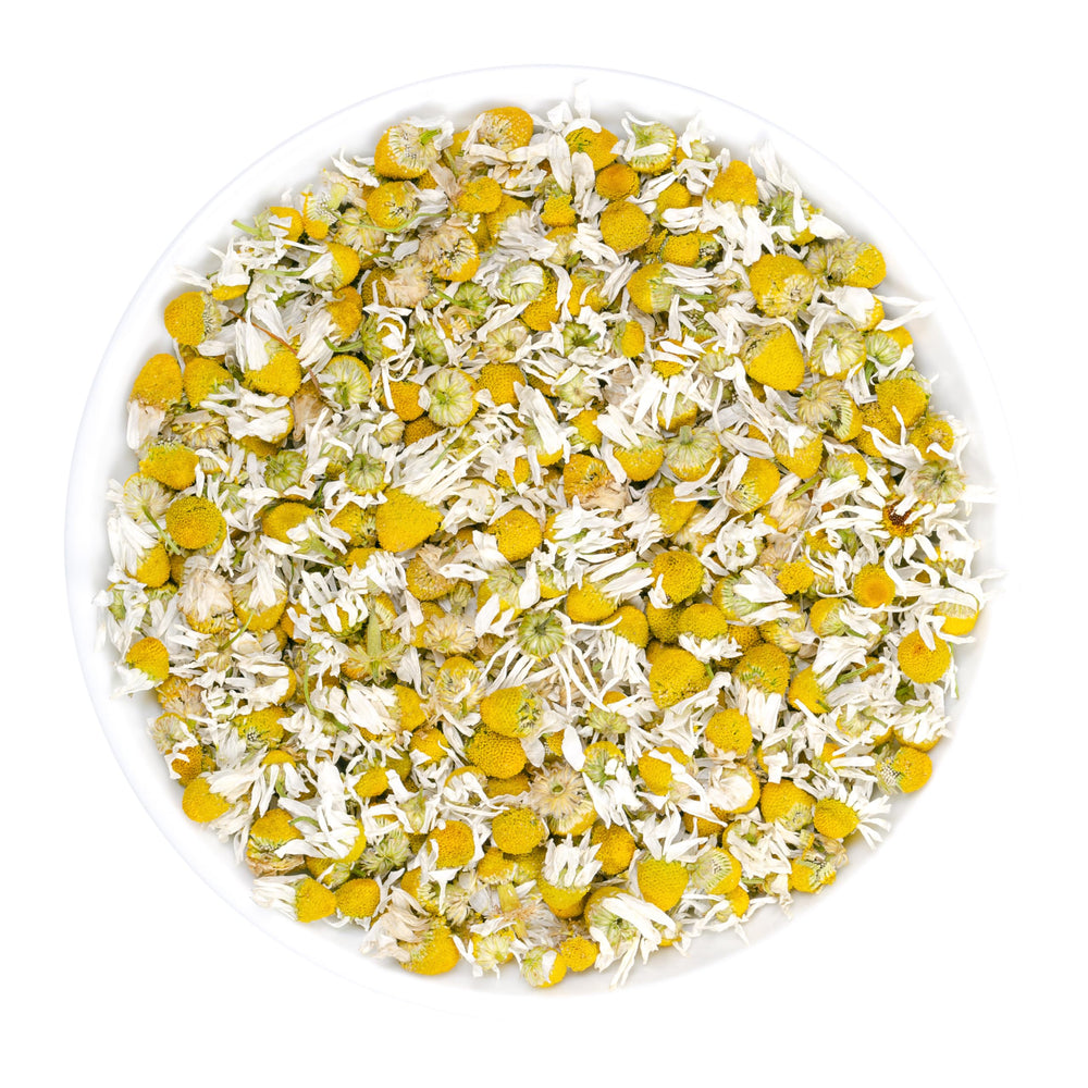 Iyasa Holistics dried chamomile flowers closeup highlighting natural petals and soothing aroma.