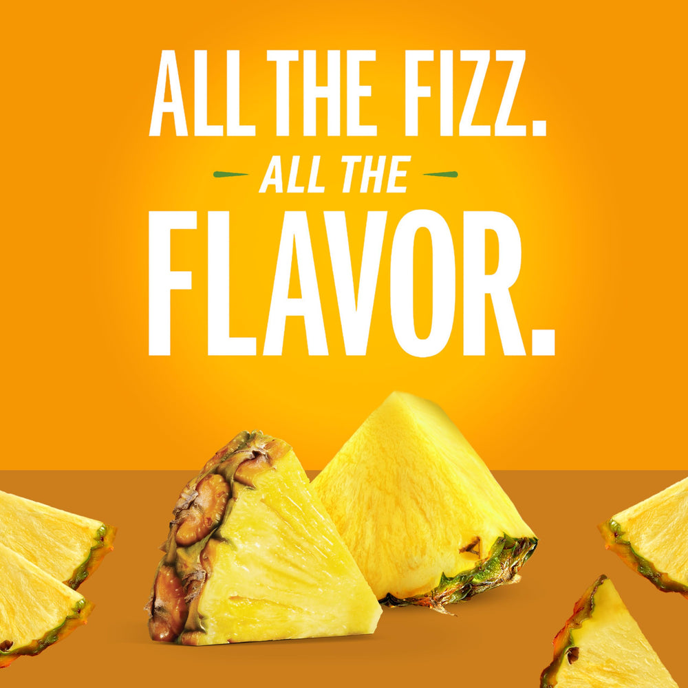 IZZE Pineapple Sparkling Juice closeup highlighting real fruit bits