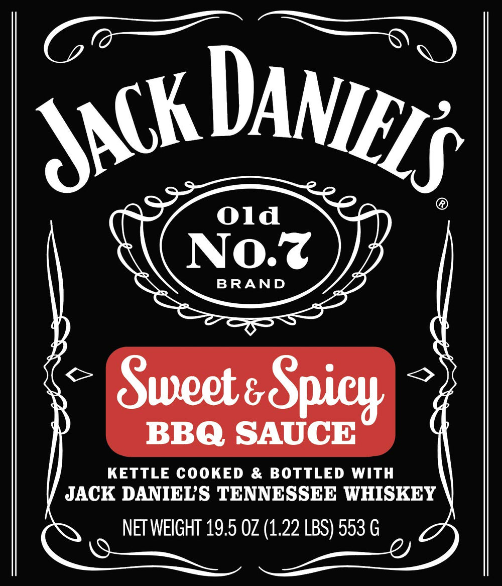 Dipping wings with Jack Daniels Barbeque Sauce Sweet and Spicy for bold taste.