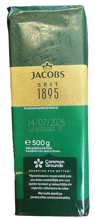 Jacobs Kronung measuring spoon with ground coffee for precise brewing