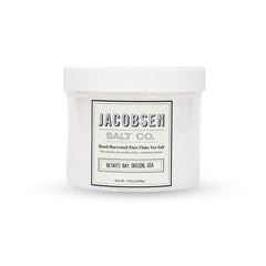 Jacobsen Salt Co. Pure Flake Finishing Salt bottle with pristine crystals for finishing.