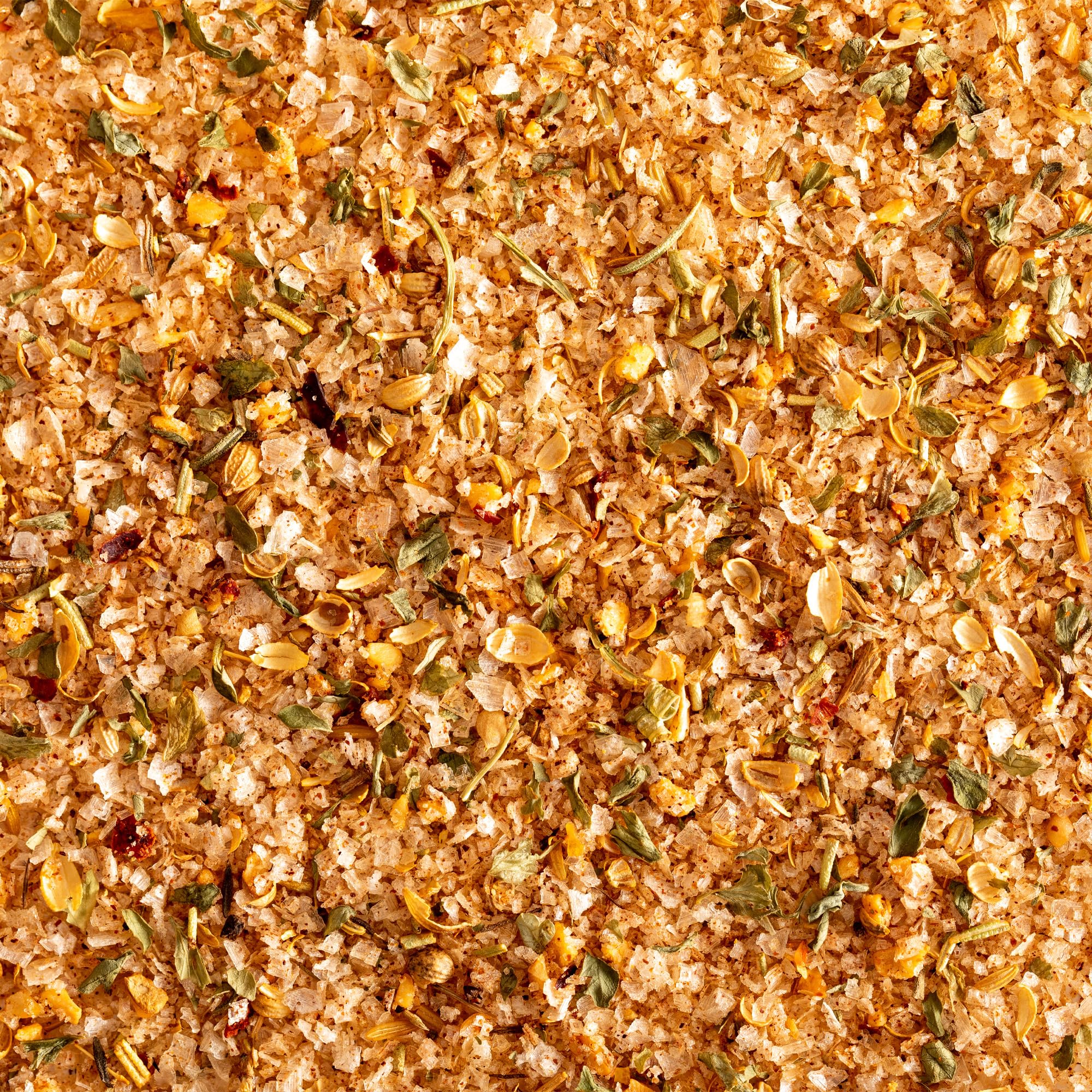 Jacobsen Salt Co. steak seasoning on a sizzling steak during grilling.