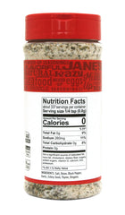 Jane's Krazy Mixed-up Original Salt Blend jar pouring onto roasted potatoes.