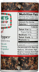 Jane's Krazy Original Mixed-Up Pepper sprinkled on meat for grilling.