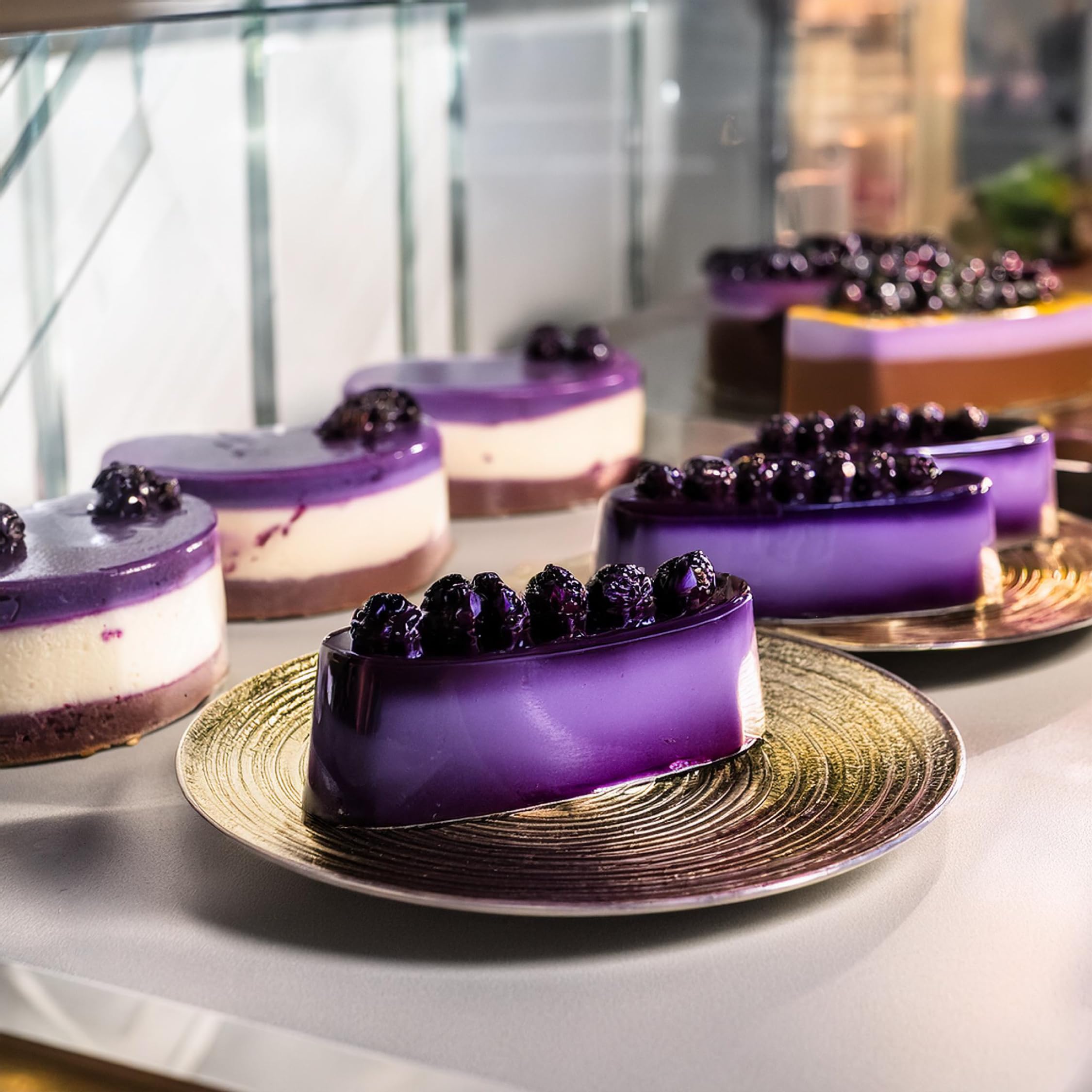 Jans Ube Condensed Milk drizzle as a dessert topping over fruits.