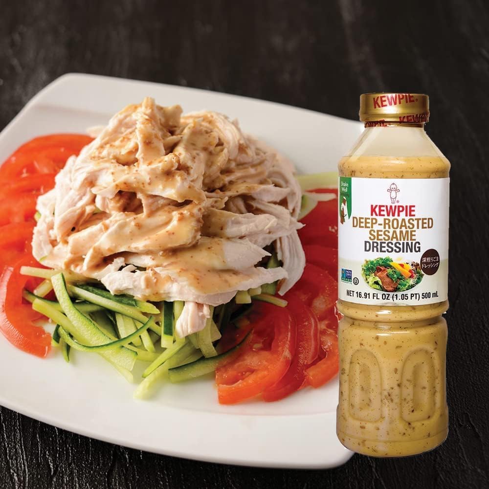 Glass bottle of Japanese Deep Roasted Sesame Dressing on kitchen counter for easy meal prep.