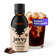 Javvy Coffee Concentrate Mocha bottle on the counter for quick hot or iced coffee.