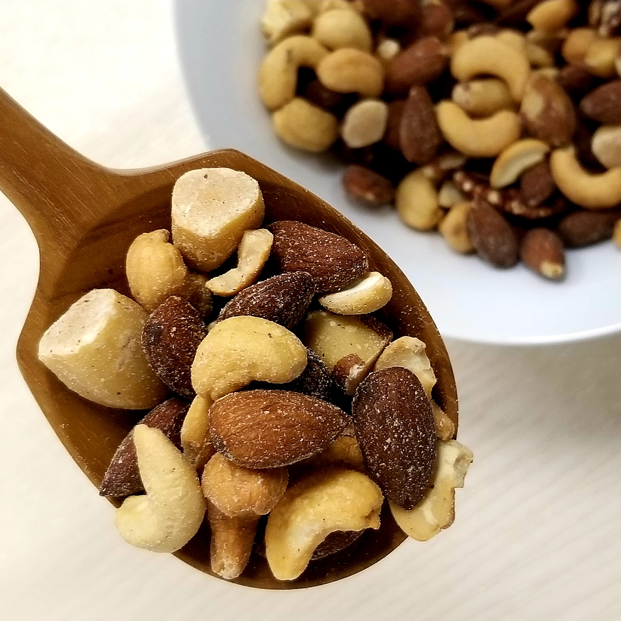 Reusable 32 oz jar stores Jaybee's Deluxe nuts to keep them fresh between uses.
