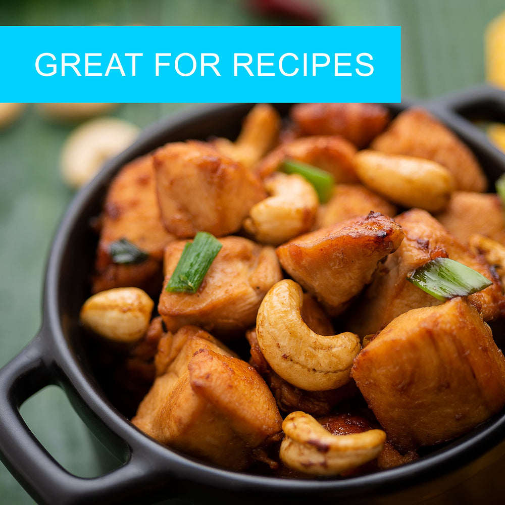 White bowl of Jaybee's cashews, perfect for salad toppings and snacks.
