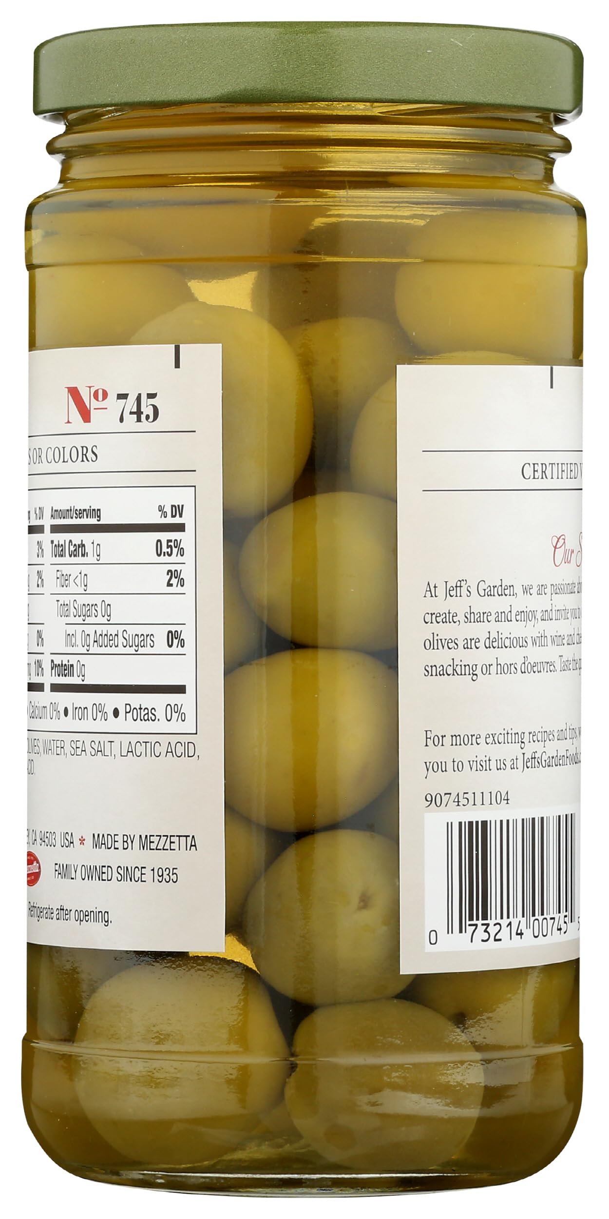Jeff's Garden Castelvetrano olives on a platter with vibrant greens for entertaining.