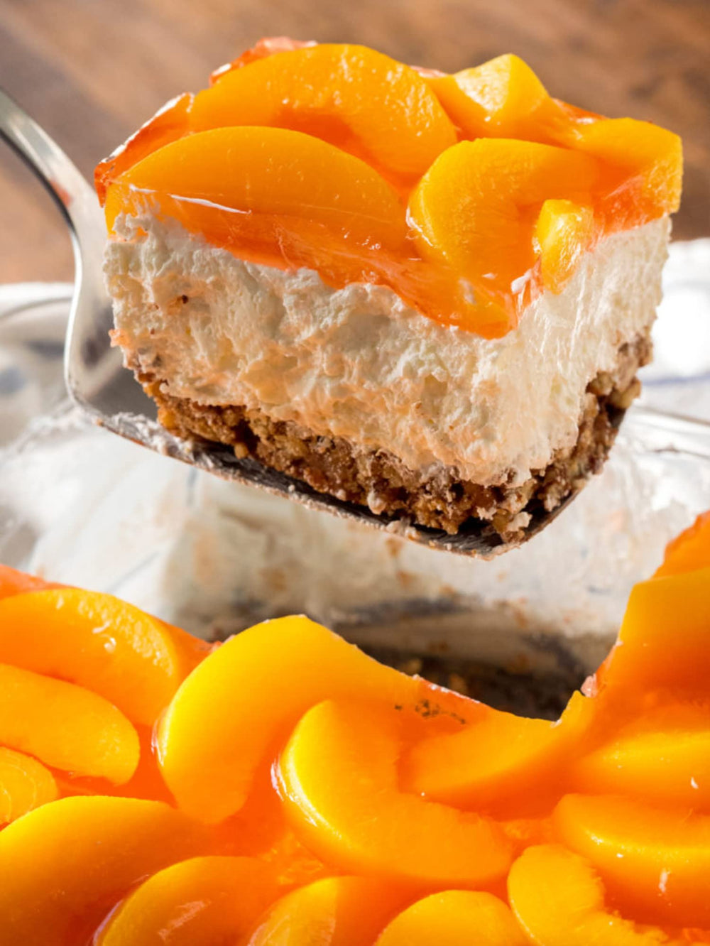 Jell-O Peach Gelatin Dessert plated with fruit garnish for serving ideas.