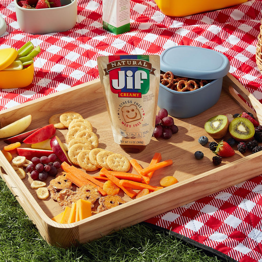 Non-GMO Jif Natural Squeeze packaging emphasizes simple ingredients.