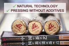 Bamboo leaf tube packaging by Jinglong Tea Factory emphasizes sustainability.