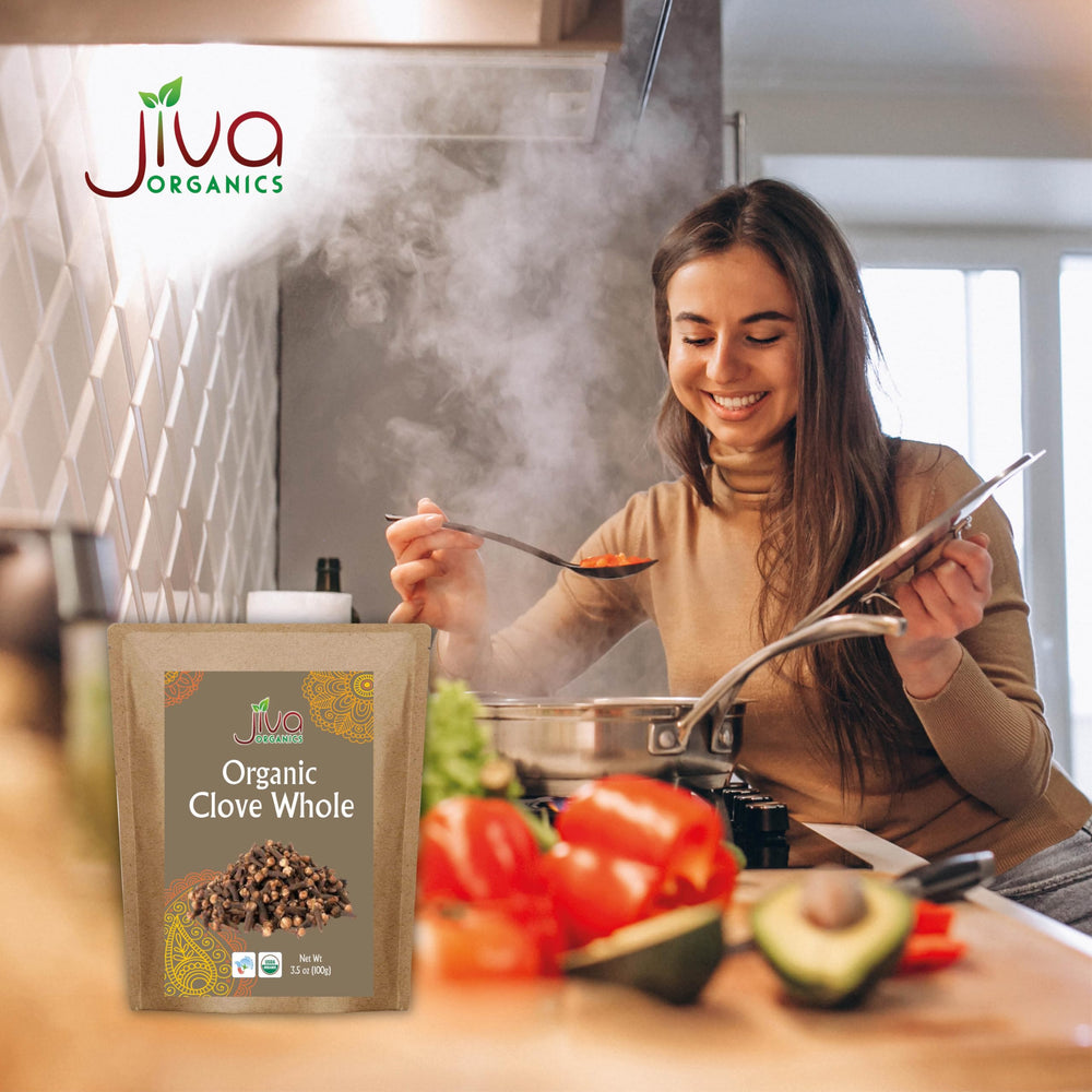 Jiva Organics cloves steeped in tea for warm flavor.