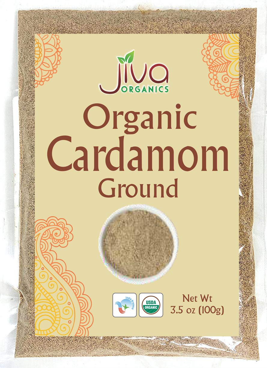 Jiva Organics ground cardamom powder jar highlights aromatic spice for curries and desserts.