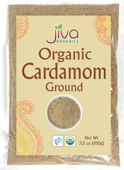 Jiva Organics ground cardamom powder jar highlights aromatic spice for curries and desserts.