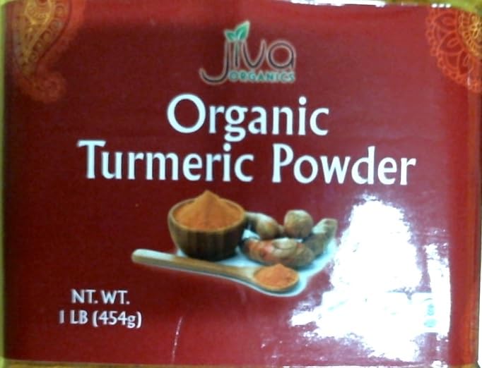 Jiva Organics Turmeric Powder closeup, fine texture ready to sprinkle