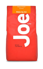 Joe Knows Coffee Wake Up Joe bag front highlighting medium roast and large 2 lb supply.
