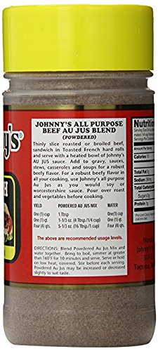 Pouring Johnny's au jus over roast beef to enhance flavor.