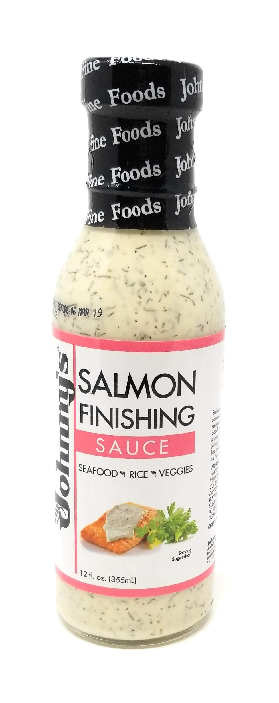 Johnny's Salmon Finishing Sauce bottle pour enhances salmon with creamy dill flavor.