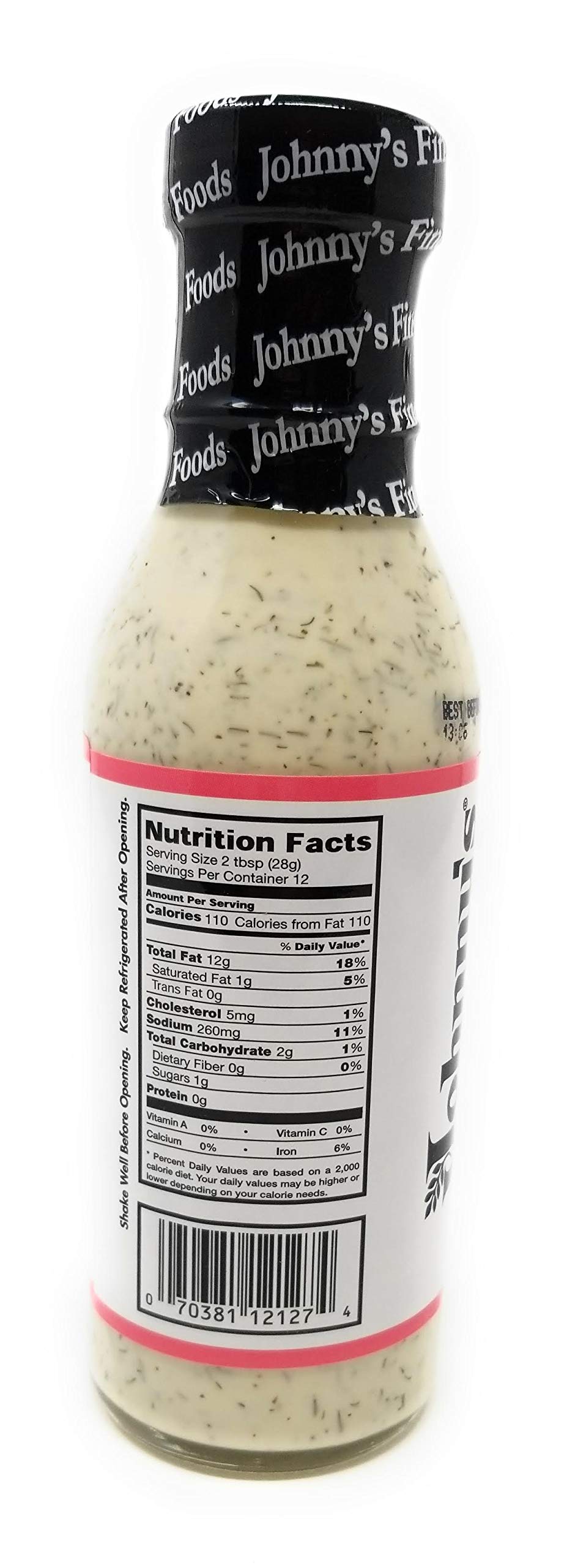 Close-up view of Johnny's Salmon Finishing Sauce label with dill notes.