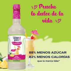 Jordan's Skinny Mixes Pina Colada bottle and glass setup for poolside mixing