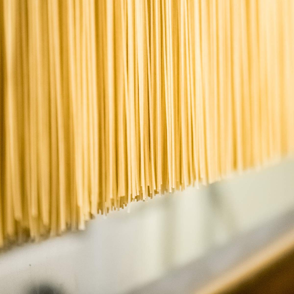 Jovial fettuccine served with sauce for a comforting meal.