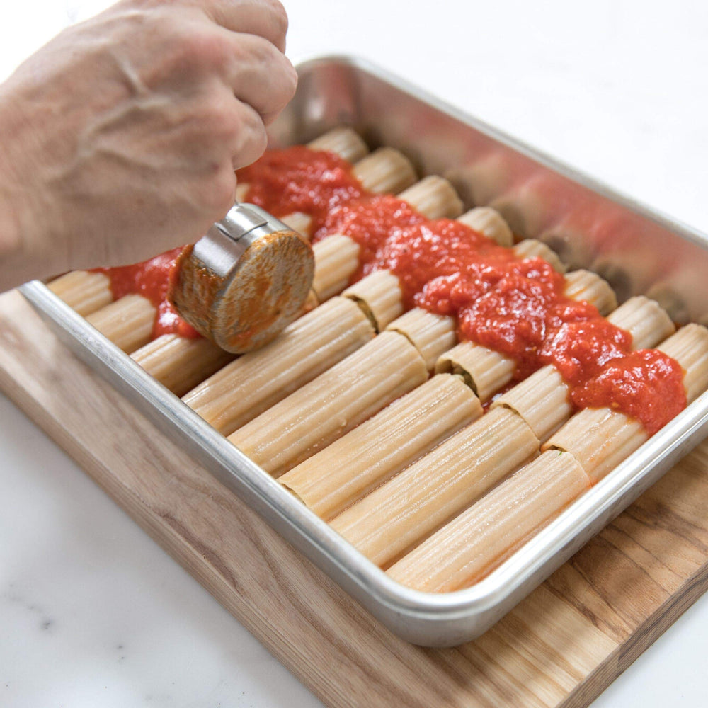 Jovial manicotti baked with cheese in a casserole dish.