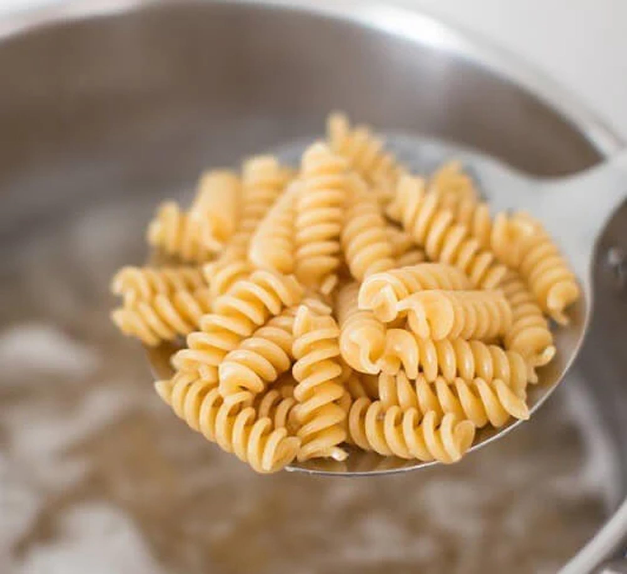 Served Jovial Einkorn pasta dish with vibrant colors and nutty notes.