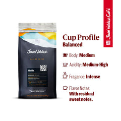Roasted Juan Valdez Huila beans glow, hinting at caramel sweetness and ripe fruit.