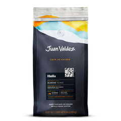 Juan Valdez Huila whole beans close-up, uniform size ideal for balanced grinding.