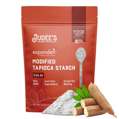 Judee's Expandex tapioca starch powder beside a bag improves baking texture.