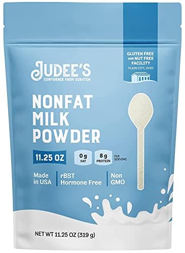 Judee's Gluten Free Non-Fat Milk Powder in resealable pouch for lasting pantry freshness.