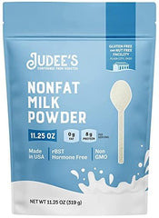 Judee's Gluten Free Non-Fat Milk Powder in resealable pouch for lasting pantry freshness.
