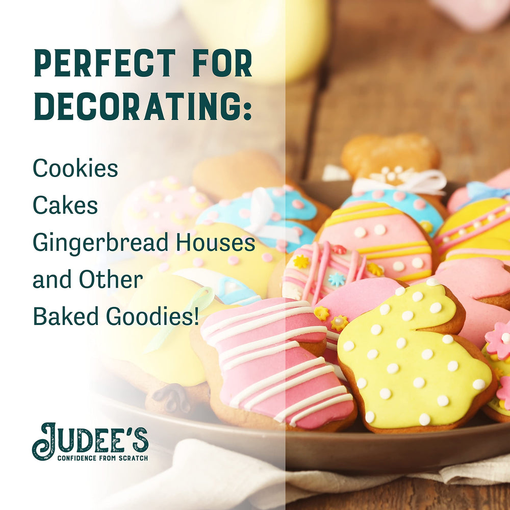Decorating sugar cookies with Judee's gluten free icing for precise coverage