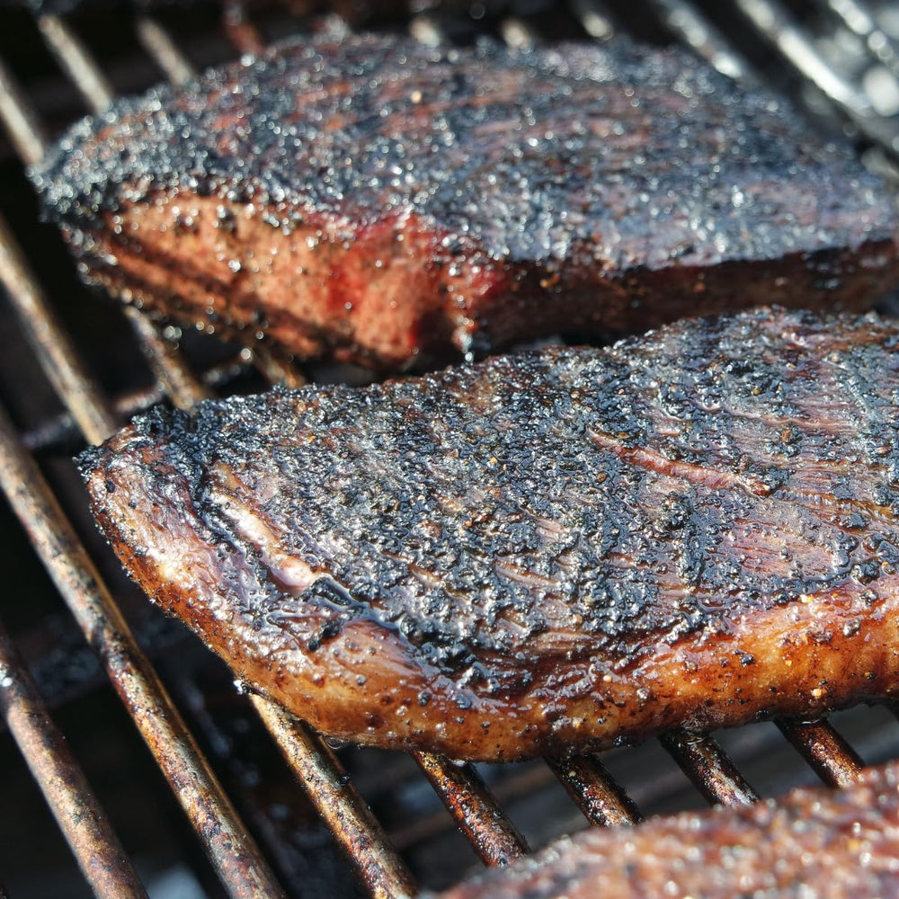 Juicy burger with Hardcore Carnivore Black rub after grilling.