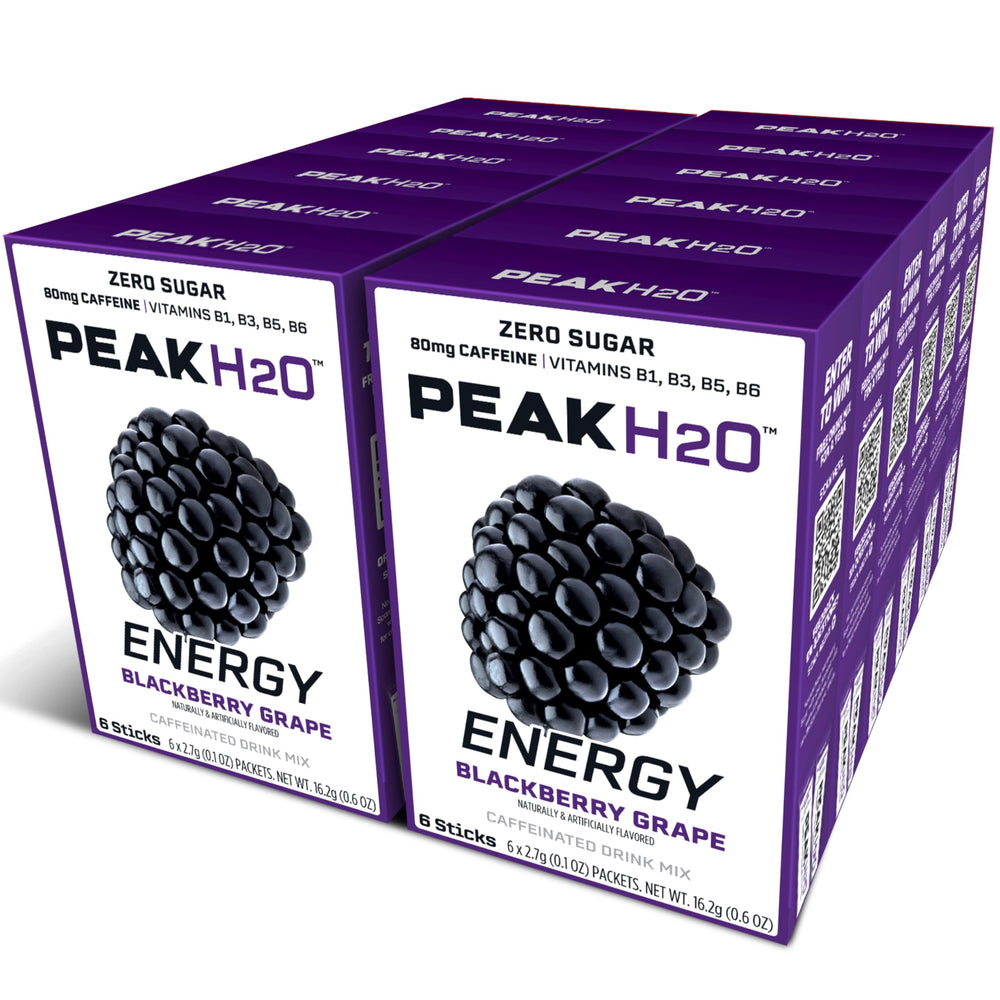 Juicy Mixes PeakH2O blackberry packet dissolving in water for refreshing hydration.